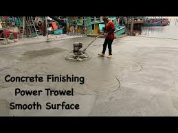 finish a smooth concrete floor slab