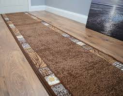 brown long carpet runner rug bordered