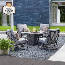 If you enjoy spending evenings with friends gathered around a cozy fire, then consider a set that has a fire table. Hampton Bay Highland Point Black Pewter 5 Piece Aluminum Outdoor Patio Fire Pit Set With Cushionguard Pewter Gray Cushions Fg Tul5pcfcalwc The Home Depot
