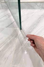 To Clean Frameless Shower Door Sweep