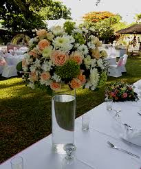 Flower Centerpiece In Tall Glass Vases