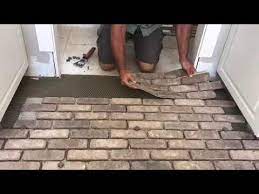 install brick flooring