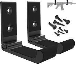 Ensure easy access to all your firepower with storage for up to 20 blasters, plus shelving and a drawer for lots of ammo and accessories! Amazon Com Aoanoko Indoor Gun Rack Wall Mount Scratchproof Rubber Cushion Foldable Hook For Protection Of Rifle Shotgun Archery Bow 20lbs Holding Strength Holder Easily Installed On Wall Door Desk Shelf Sports