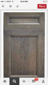 Gray was paired here with other similar colors such as white and a very faint shade of blue. Gray Brown Stain For Cabinets Traditional Kitchen Cabinets Kitchen Cabinet Colors Staining Cabinets