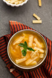 clear tomato soup with herbs