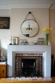 mantel display mirror over fireplace