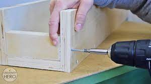 Two people at a table, collaborating and making design changes on . Diy Table Saw Fence Router Table Fence Free Plan 9 Steps With Pictures Instructables