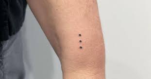 what does a party dot tattoo mean