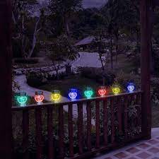 set of 4 colour changing solar stake lights