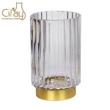 modern wavy glass vase with gold base