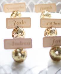 Just place these marble pieces and it means you reserve the table for that specific person or family. Gallery Gold Balls Wedding Place Card Holders Deer Pearl Flowers