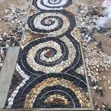 stacked wall pebble mosaic standing