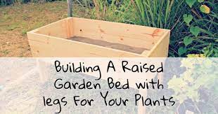 Diy wood pallet planter box. Building A Raised Garden Bed With Legs For Your Plants Diy Farmer Life