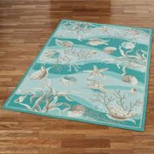 teal ocean seas area rugs