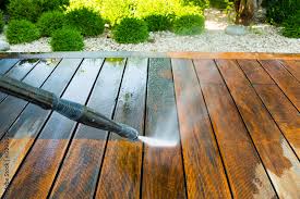 cleaning terrace with a power washer