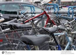 bicycles parked on a busy street with