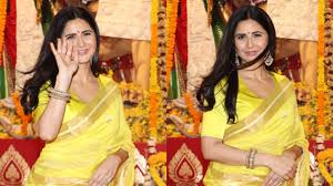 yellow saree with u neck blouse