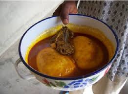 Our recipe for fufu uses true yams, first boiling them and then pounding in a wooden mortar and pestle until they're. Typical Ghanaian Dish Fufu With Oil Palm Soup And Bushmeat Download Scientific Diagram
