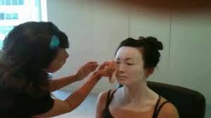 geisha makeup application and kimono