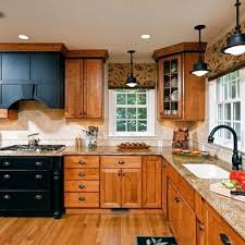coordinate finishes with oak cabinets