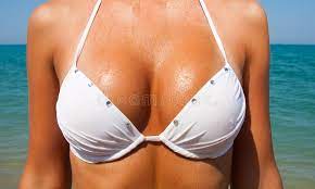 Beautiful Large Female Breasts in a White Swimsuit. Stock Image - Image of  beautiful, people: 30124821