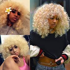 If blonde hair is like everyone's bubbly best friend and curly hair is like everyone's spunky one, being both blonde and curly should be considered nothing less than a beauty power move. Short Blonde Curly Synthetic Hair Wigs Fora Nbsp Black Women Andromeda Soft Fluffy Big Curls Hair Wig Loose Curly Africana Nbsp American Costume Cosplay Cheap Half Wigs 1 Free Wig Cap Walmart Canada