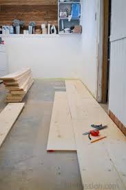 how to install a barn board floor over