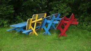 Colourful Picnic Benches Stacked