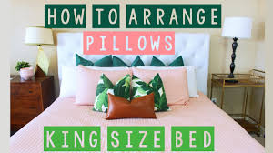 arrange pillows on a king size bed