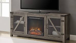 this tv console with a fireplace is on