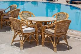 Rattan Table And Chairs In Beach Cafe