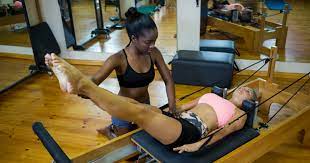 pilates lifting weights benefits of