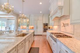 Aesthetic french country style kitchen units of wood finished in white. Country Kitchen Design Ideas Houzz