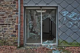 file broken glass door leading to the