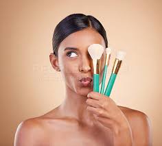 skincare brush and indian woman with