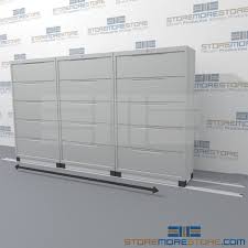 This hang rail pack includes two 15.5 rails that attach to existing front to back rails of 42 wide lateral file cabinets steel hang rails: File Cabinets On Tracks High Density Files Sliding File Cabinets Space Saver File Cabinets Moving File Cabinets Rolling File Drawers Locking High Capacity Filing System