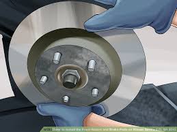 How To Install The Front Rotors And Brake Pads On Nissan