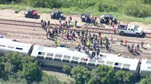 dies after Amtrak train derailment