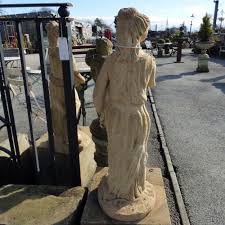 reclaimed concrete garden statue of a