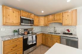 With Maple Cabinets