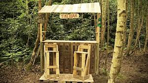 a tiki bar from recycled pallet wood