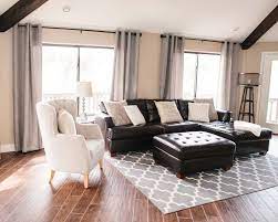 living room with dark furniture