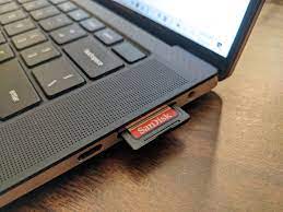 Insert sd card into the corresponding slot on one end of card reader, and then connect the usb interface on the other end of card reader to computer. Why Your Laptop S Sd Card Reader Might Be Terrible Pcworld