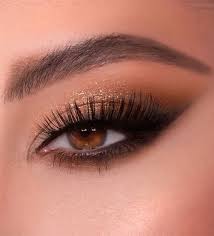 eye makeup trends gold glam smokey