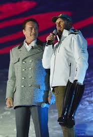 Hermann maier is an austrian former world cup champion alpine ski racer and olympic gold medalist. Arnold Schwarzenegger Hermann Maier Share Stage At Opening Ceremony Of Ski World Championship Times Colonist