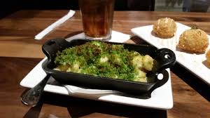 Through the years, the hush puppy has been a popular destination for locals and visitors alike. Hatch Chile Bacon Mac N Cheese Is Shown At Lazy Dog With Loaded Potato Hush Puppies In The Back File Las Vegas Review Journal