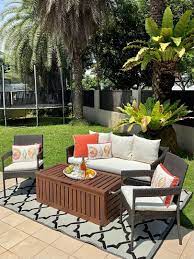 outdoor sofa chairs and storage table