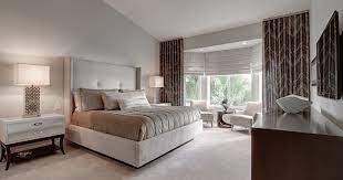 decorate a master bedroom with bay windows