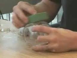Hand Sanding Glass You