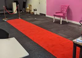 thick red carpet with ropes and